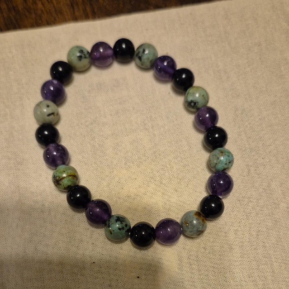 Elegant Purple and Green Beaded Bracelet